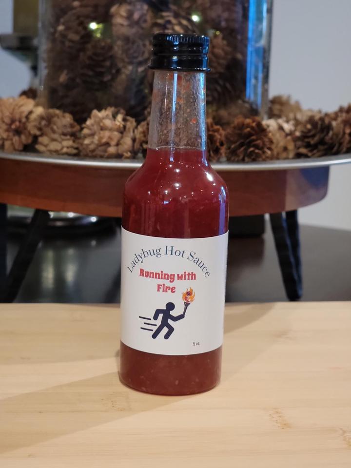 5 oz bottle of Running with Fire
